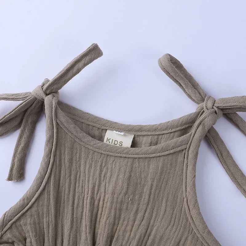 Wholesale Baby Girls Crease Solid Color Lace-up Romper - Image 19